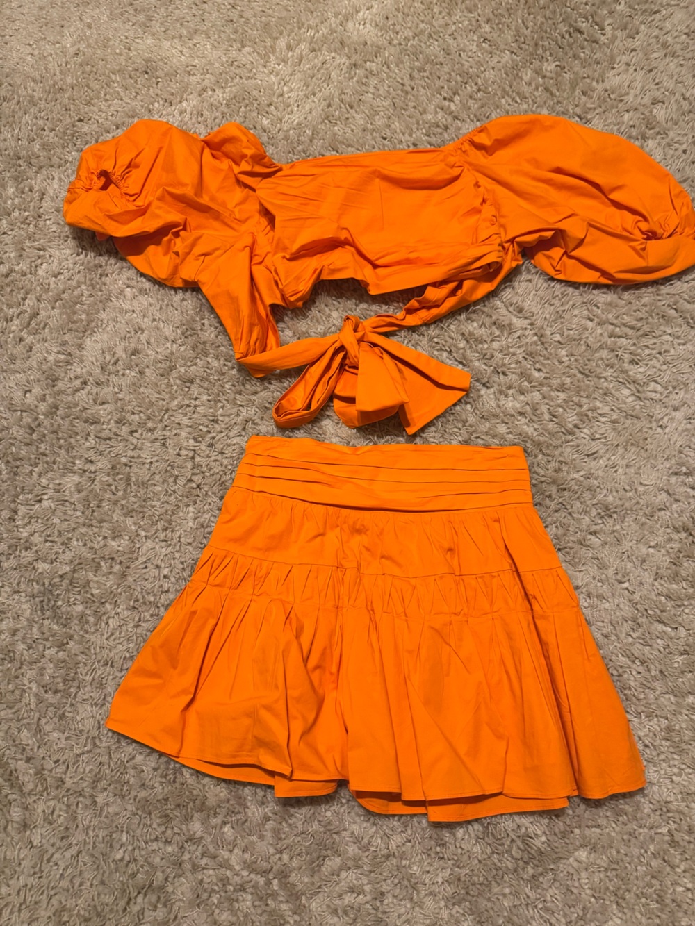 Ramy Brook Two-Piece Pleated Skirt Set in Vibrant Orange